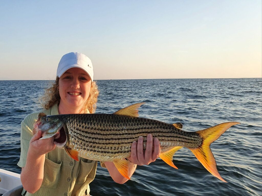 Amy Goldring catching Tiger Fish on Lake Kariba