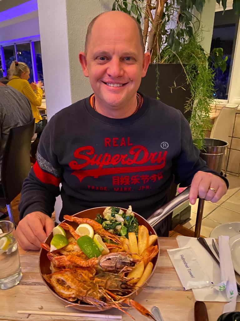 Clyde Beaty enjoying a seafood platter in Camps Bay Cape Town